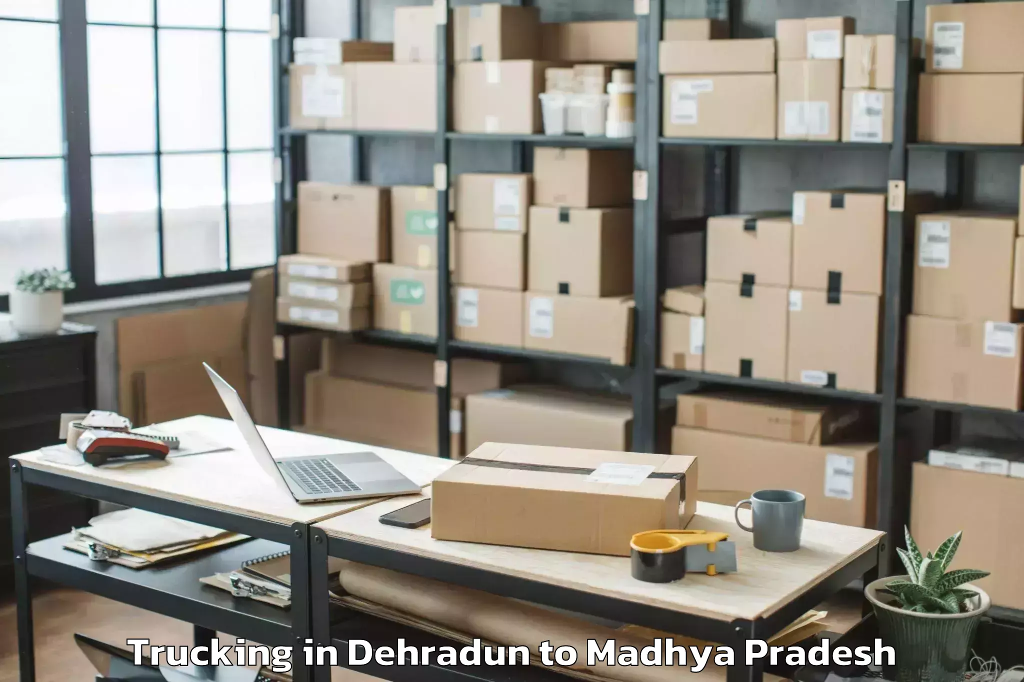 Book Dehradun to Dhamnod Trucking